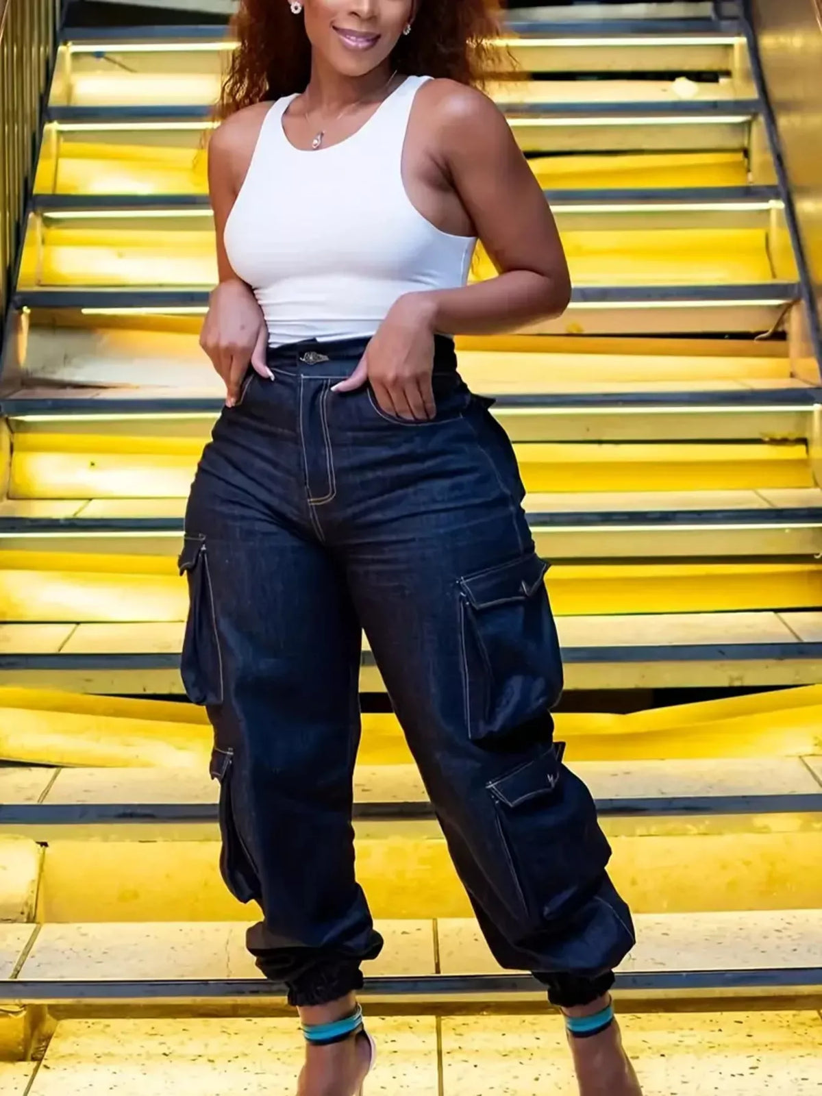 Plus size high-waisted blue cargo jeans, front view