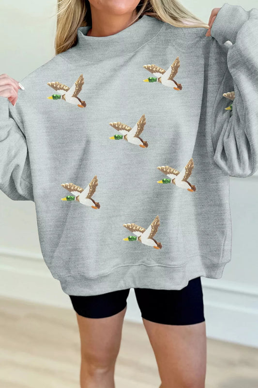 Gray sequin mallard graphic mock neck baggy sweatshirt, front view