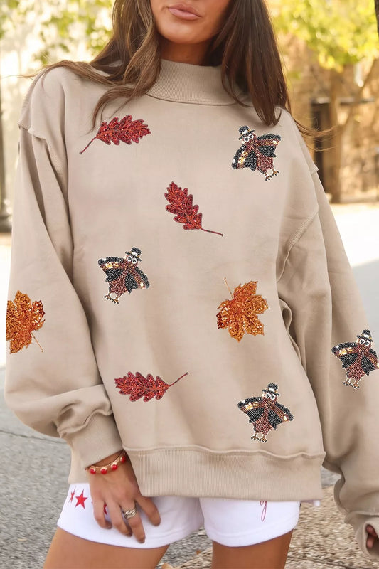 Khaki sequin turkey leaf graphic mock neck sweatshirt, front view