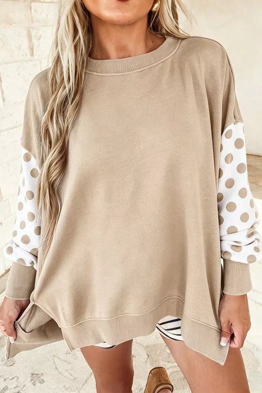 Tan crew neck sweatshirt with polka dot sleeves, front view